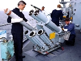 Royal_Navy-Loading_Chaff_Rockets